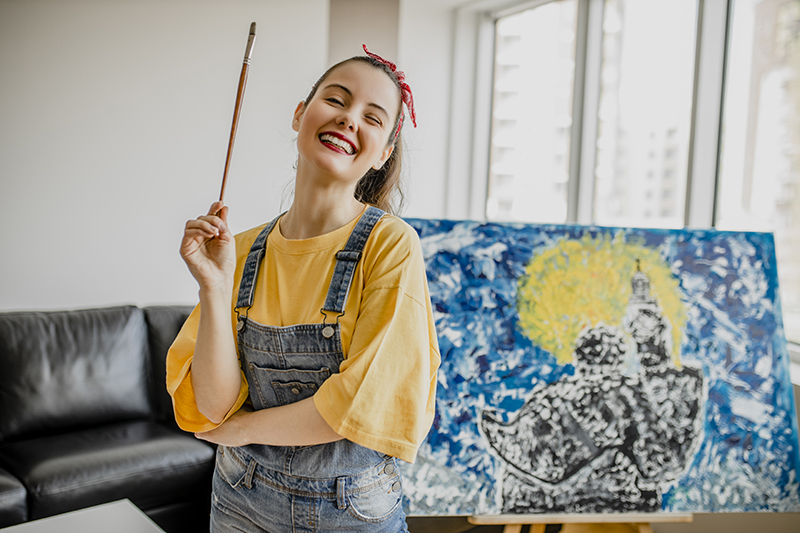 women with paint brush